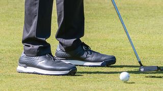 Puma Alphacat Leather golf shoes on a putting green