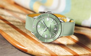 Breitling watch with green strap and dial