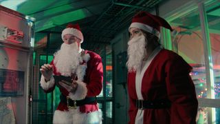 Connor Swindells as Nick and Olivia Holt as Sophia in Jingle Bell Heist.