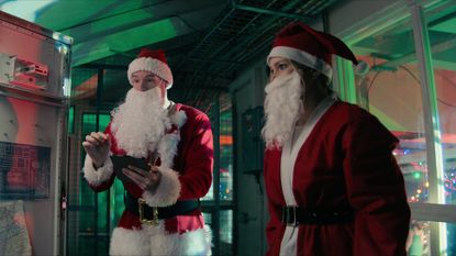 Connor Swindells as Nick and Olivia Holt as Sophia in Jingle Bell Heist.