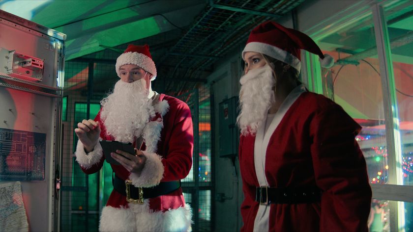 Connor Swindells as Nick and Olivia Holt as Sophia in Jingle Bell Heist.