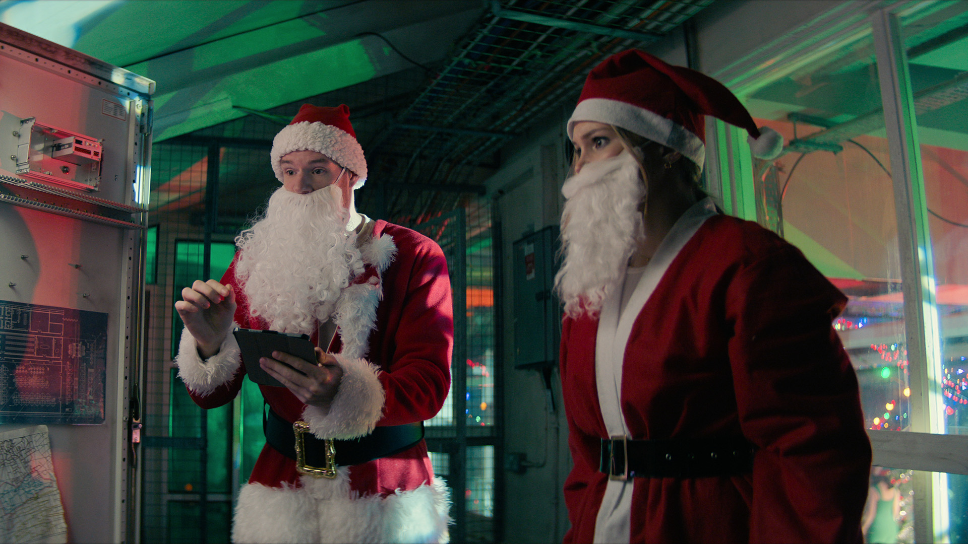 Connor Swindells as Nick and Olivia Holt as Sophia in Jingle Bell Heist.