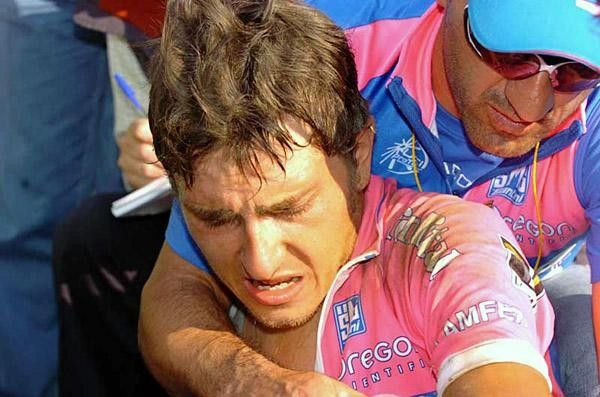 Enrico Franzoi (Lampre) collapses with exhaustion and disappointment