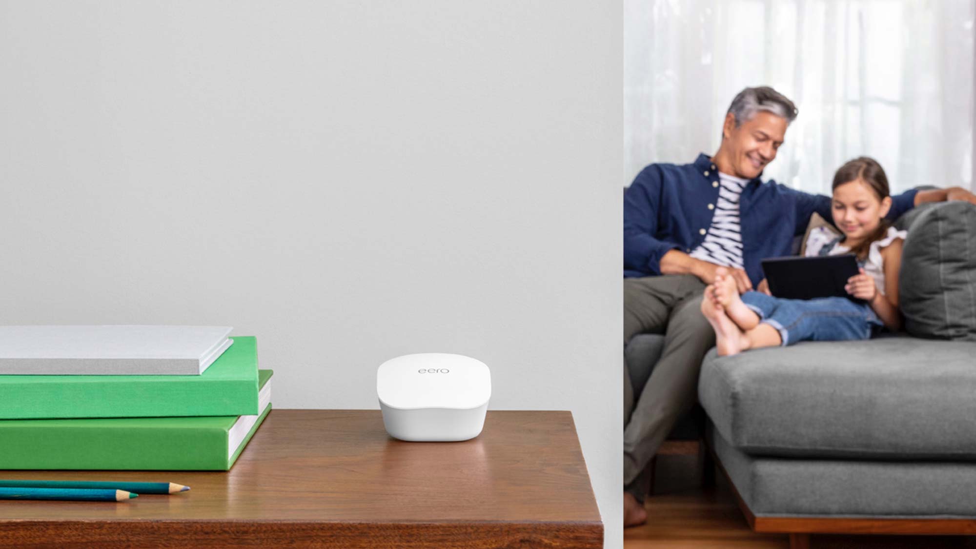 A parent and child using an Eero mesh router