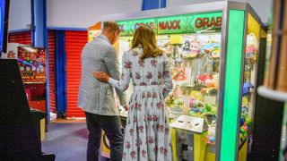 barry, wales august 05 prince william, duke of cambridge and catherine, duchess of cambridge play a grab a teddy game at island leisure amusement arcade, where gavin and stacey was filmed, during their visit to barry island, south wales, to speak to local business owners about the impact of covid 19 on the tourism sector on august 5, 2020 in barry, wales photo by ben birchall wpa poolgetty images