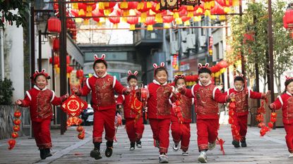 Children in Huzhou, China, celebrate the Year of the Rabbit.