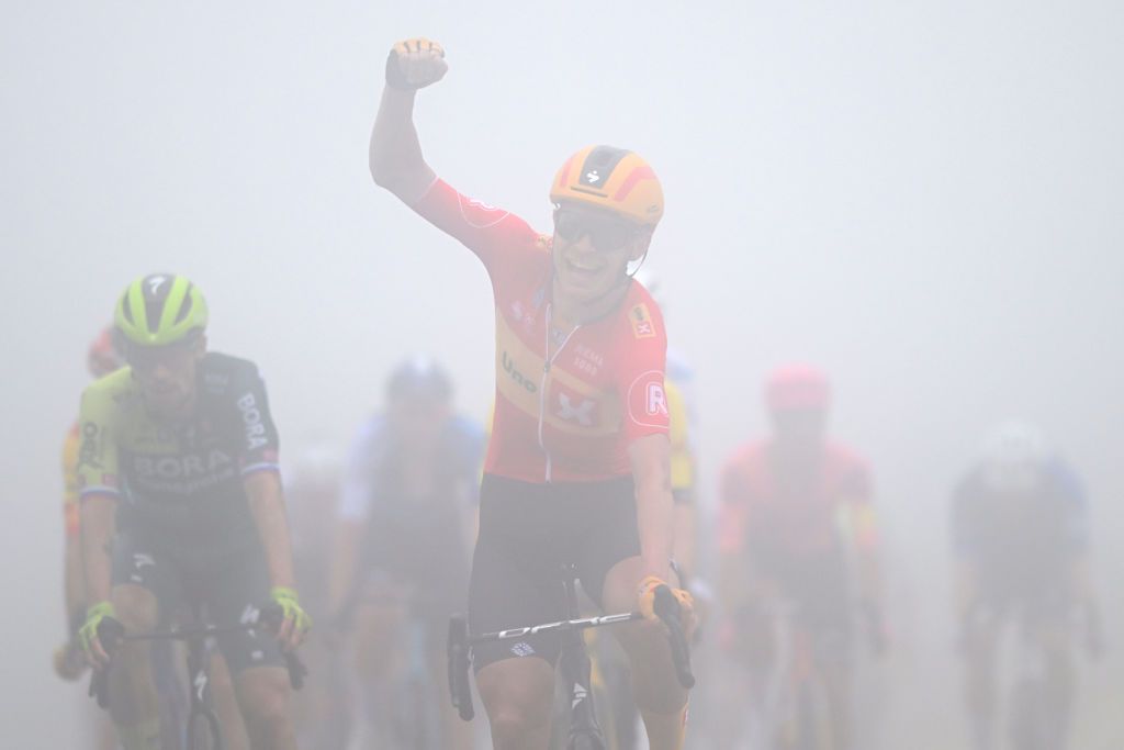 COL DE LA LOGE FRANCE JUNE 03 Magnus Cort Nielsen of Denmark and Team UnoX Mobility celebrates at finish line as stage winner during the 76th Criterium du Dauphine 2024 Stage 2 a 142km stage from Gannat to Col de la Loge 1251m UCIWT on June 03 2024 in Col de la Loge France Photo by Dario BelingheriGetty Images