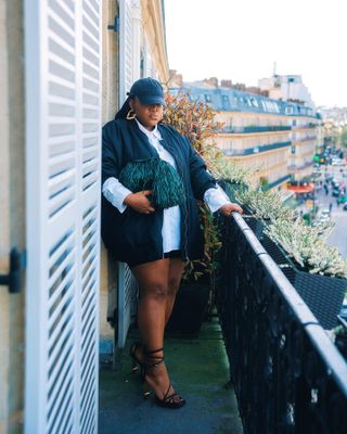 bomber jacket and shorts outfit in Paris