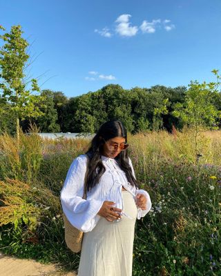 beauty products to avoid during pregnancy: Monikh wearing white shirt and skirt