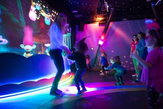 Using NEC Displays, Feld Entertainment created what it calls a “holographic” dance party where—with glasses on—animated figures appear to float out from the screen and over the crowd. 