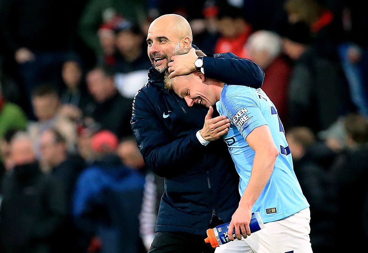 Pep Guardiola and Oleksandr Zinchenko file photo