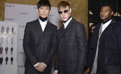 Three models in suits