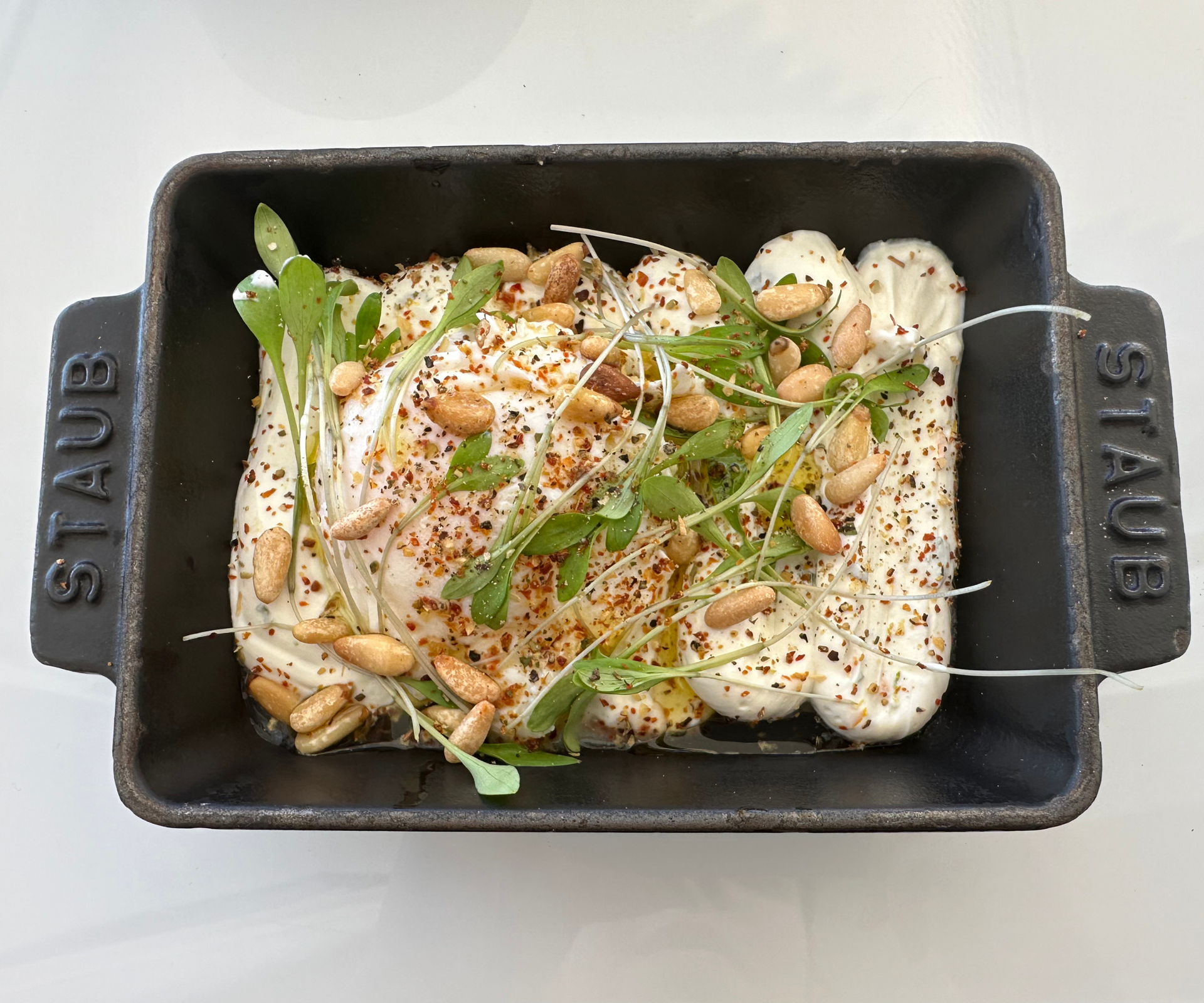Baked Turkish eggs in a small Staub Cast Iron Rectangular Roasting Dish