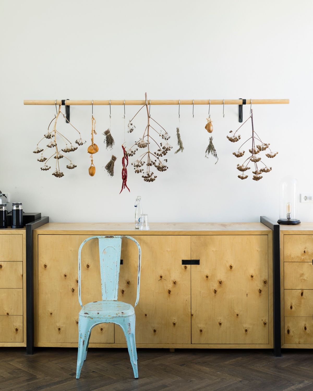 aLL white paint color used on kitchen wall above wooden kitchen cabinet