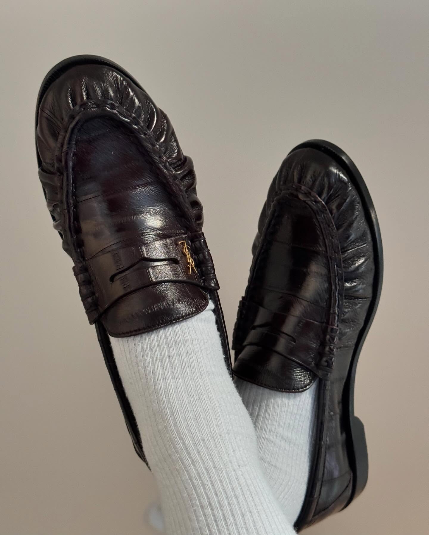 An image of @claire_most wearing one of the most iconic shoes, the Saint Laurent Le Loafer.
