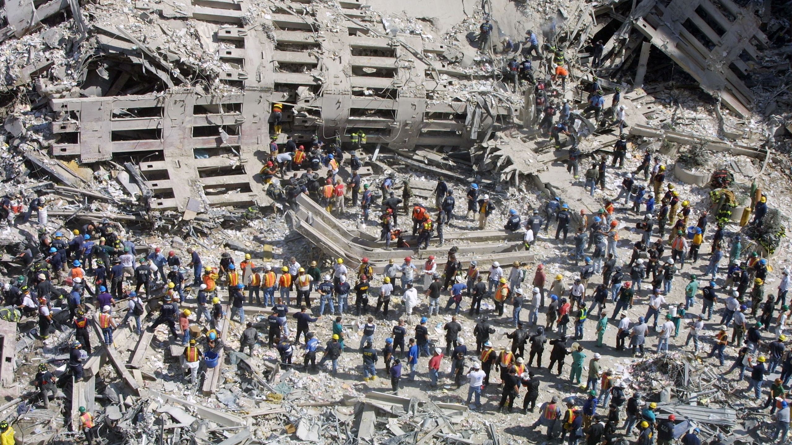 “I just put down my cameras and wept.” He was only on the job for two months. He still captured some of the most devastating images of 9/11