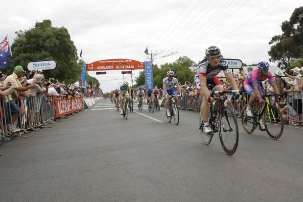 Andre Greipel (Lotto Belisol) sweeps through the finish area.