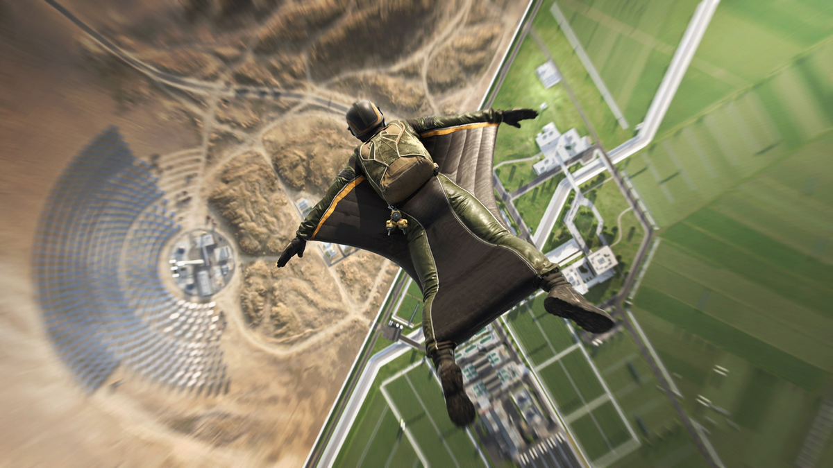 A soldier in Battlefield 2042 gliding in a wingsuit