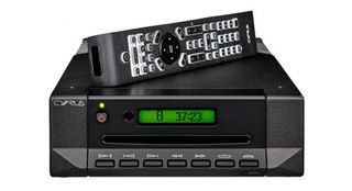 Cyrus CD t CD transport in black finish with remote on top of unit.