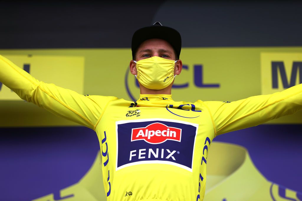 LAVAL ESPACE MAYENNE FRANCE JUNE 30 Mathieu Van Der Poel of The Netherlands and Team AlpecinFenix Yellow Leader Jersey celebrates at podium during the 108th Tour de France 2021 Stage 5 a 272km Individual Time Trial stage from Chang to Laval Espace Mayenne 90m Lion Mascot ITT LeTour TDF2021 on June 30 2021 in Laval Espace Mayenne France Photo by Tim de WaeleGetty Images
