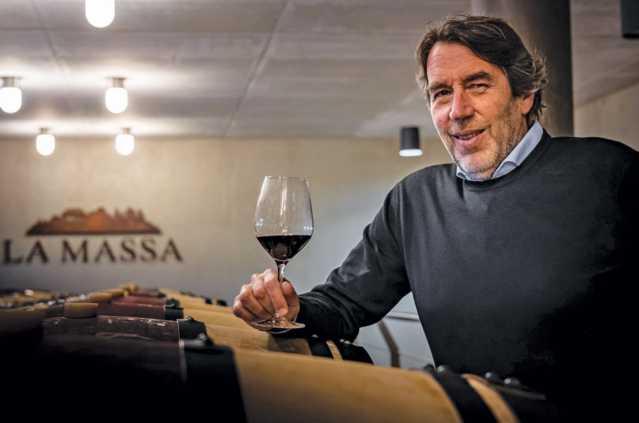 Winemaker Giampaolo Motta sampling his wine