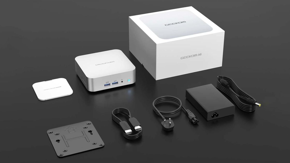 Geekom A8 with manual, VESA mount, HDMI cable, and power cable.