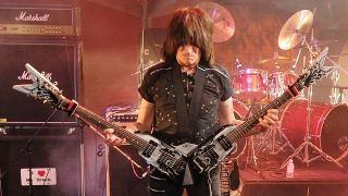 American guitarist Michael Angelo Batio performing at a Dean Guitars event in London with his custom dual-neck guitar, taken on August 11, 2009. (Photo by Total Guitar Magazine/Future via Getty Images)