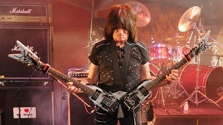 American guitarist Michael Angelo Batio performing at a Dean Guitars event in London with his custom dual-neck guitar, taken on August 11, 2009. (Photo by Total Guitar Magazine/Future via Getty Images)