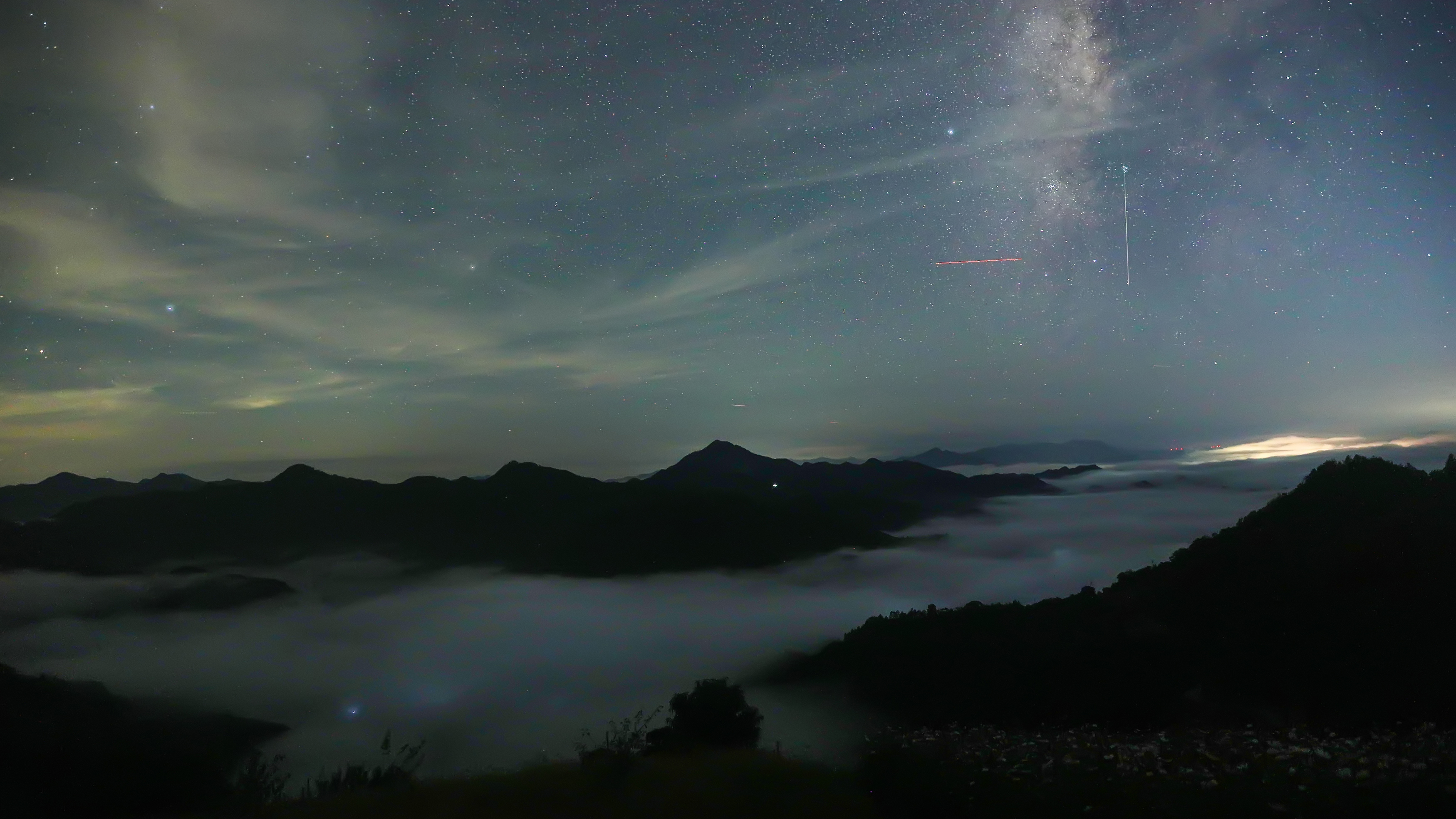 SHITAN, CHINA - AUGUST 12: The Perseid meteor shower lights up the night sky on August 12, 2026 in Shitan Village, Huangshan, Anhui Province of China. The Perseid meteor shower will be visible on Wednesday night and before dawn Thursday morning, reaching its expected peak -- or point of maximum meteor activity -- on Thursday at 10:53 a.m. ET, according to EarthSky. (Photo by Fan Chengzhu/VCG via Getty Images)