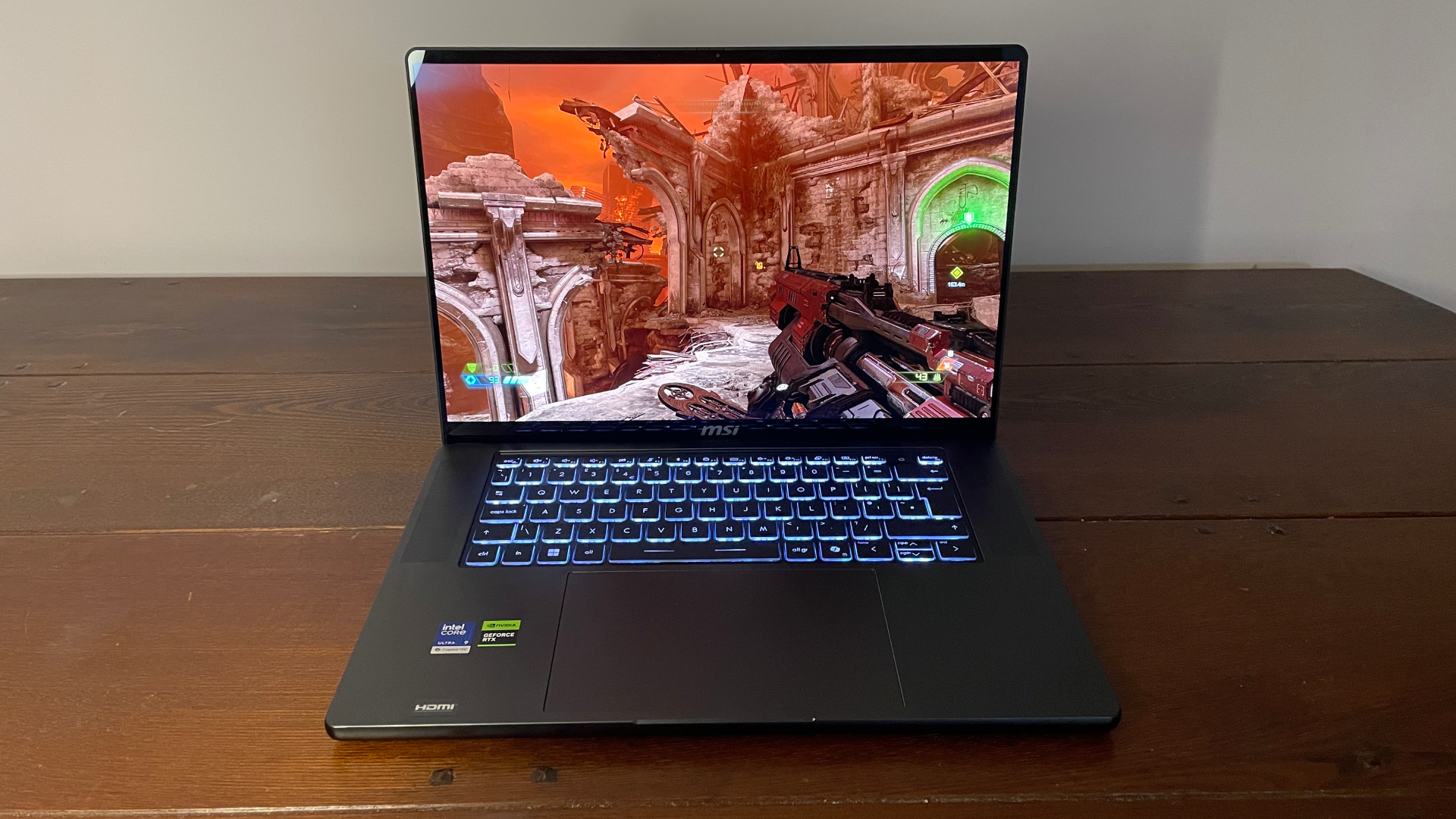 An MSI Stealth 16 AI+ gaming laptop with RTX 5080 mobile (125 W).