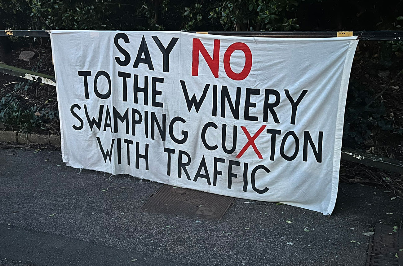 A protest banner related to plans for an English winery development in Kent.
