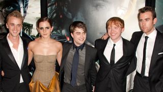 om Felton, Emma Watson, Daniel Radcliffe, Rupert Grint, and Matthew Lewis attend the premiere of "Harry Potter and the Deathly Hallows: Part 2" at Avery Fisher Hall, Lincoln Center on July 11, 2011 in New York City.