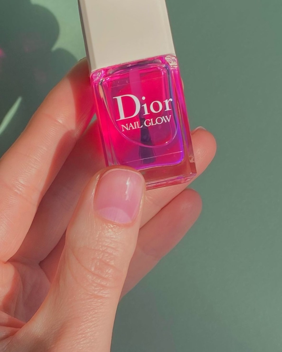Sheer pink nails with Dior Nail Glow nail polish