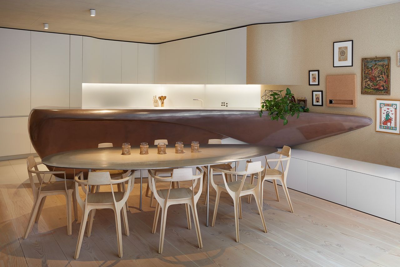 Basement kitchen, dining and living area