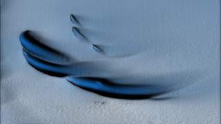  Visualization of the sand dune shaped ice structures, with three large and three small curves of dark under the ice