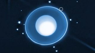 a blue orb surrounded by white dots