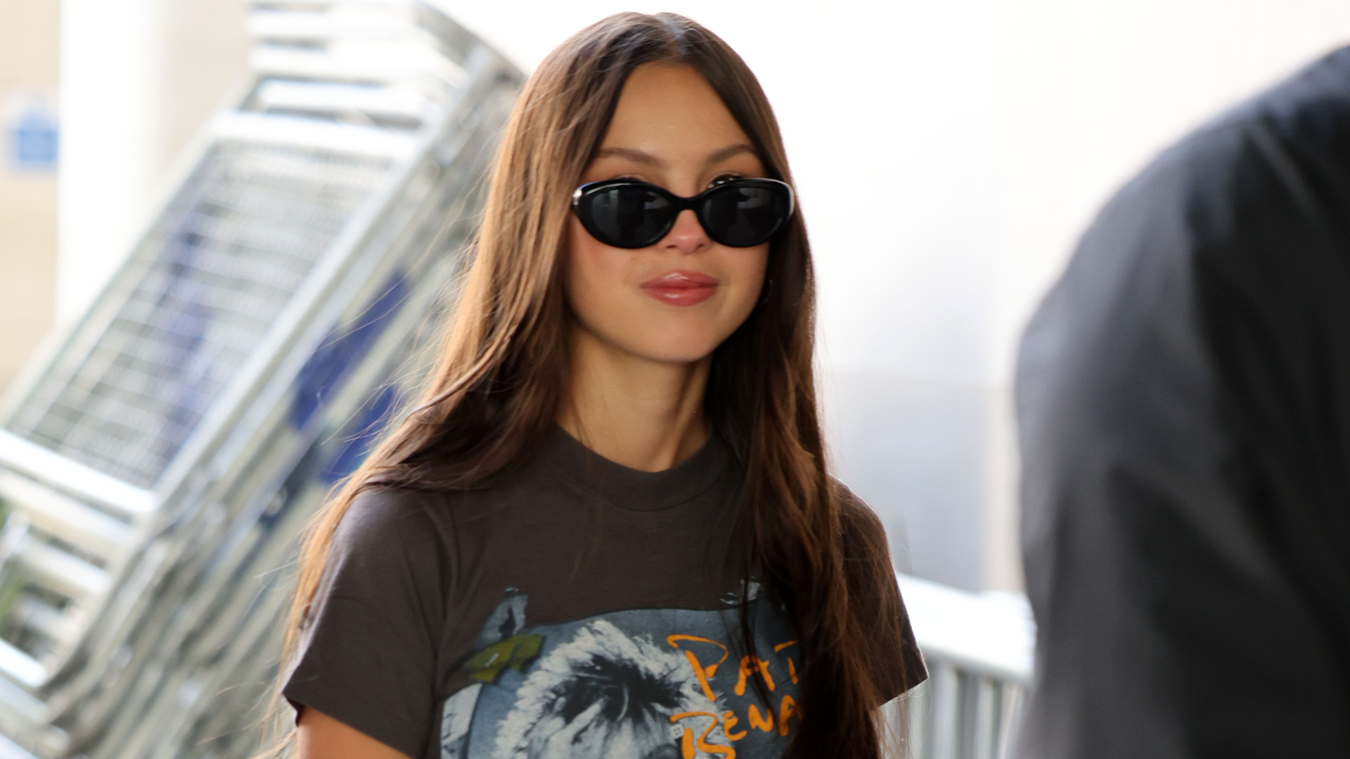 Olivia Rodrigo styles Dakota Johnson's Nike Cortez Sneakers in red