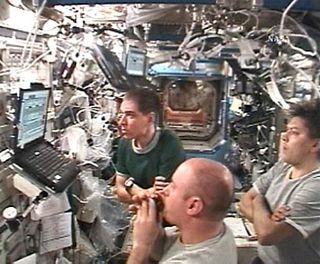 Space Station Crew Awaits Orbital Plumbers