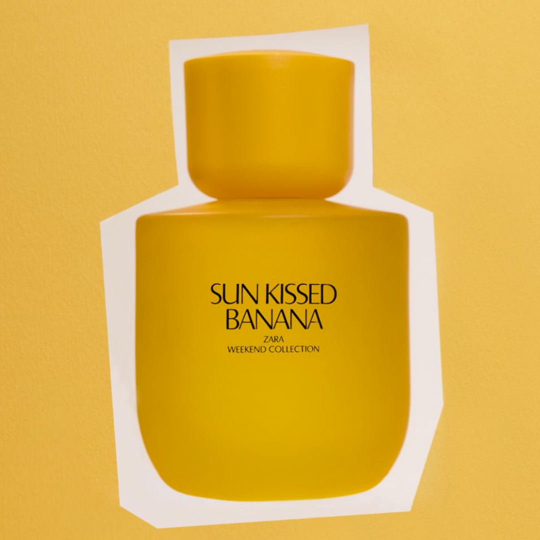 A product shot of the ZARA Sun Kissed Banana perfume, on a yellow paper cut-out-style background