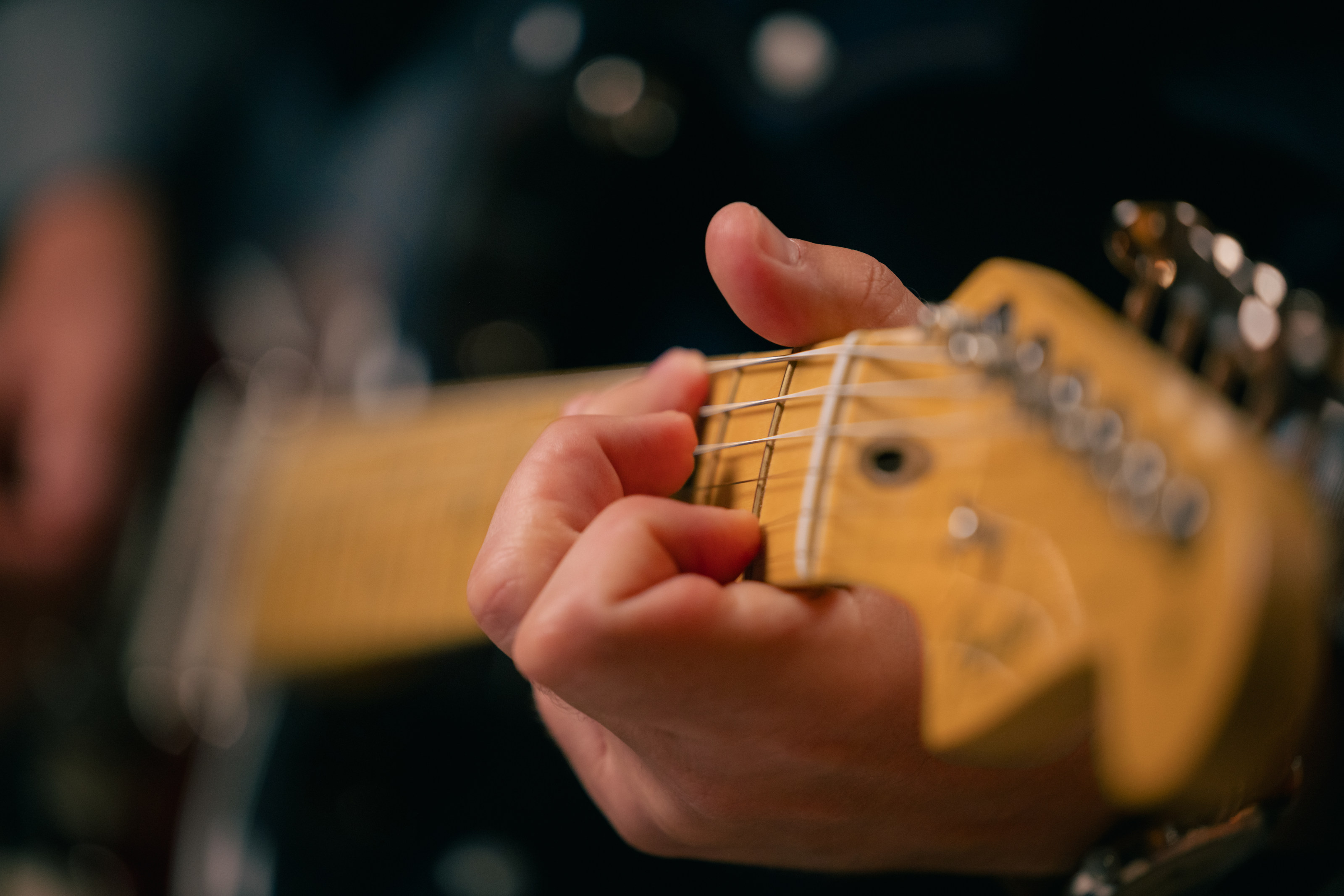 A Fender Strat in the hands of guitarist Tom Renaud