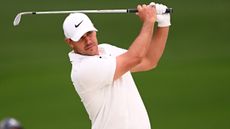 Brooks Koepka takes a shot on the second hole during the second round of the 2023 Masters