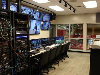 The WHJI main control room is a skybox that overlooks the 5,000 seat gymnasium.