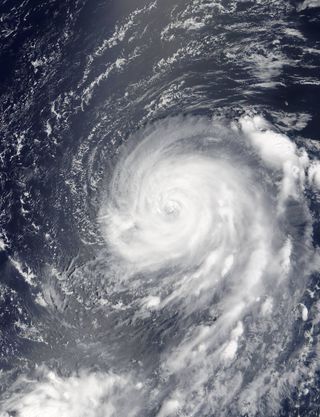Typhoon Noru tears across the northwestern Pacific Ocean toward Japan on July 31, 2017. MODIS on board NASA's Terra satellite passed over the massive storm, capturing this visible-light image.