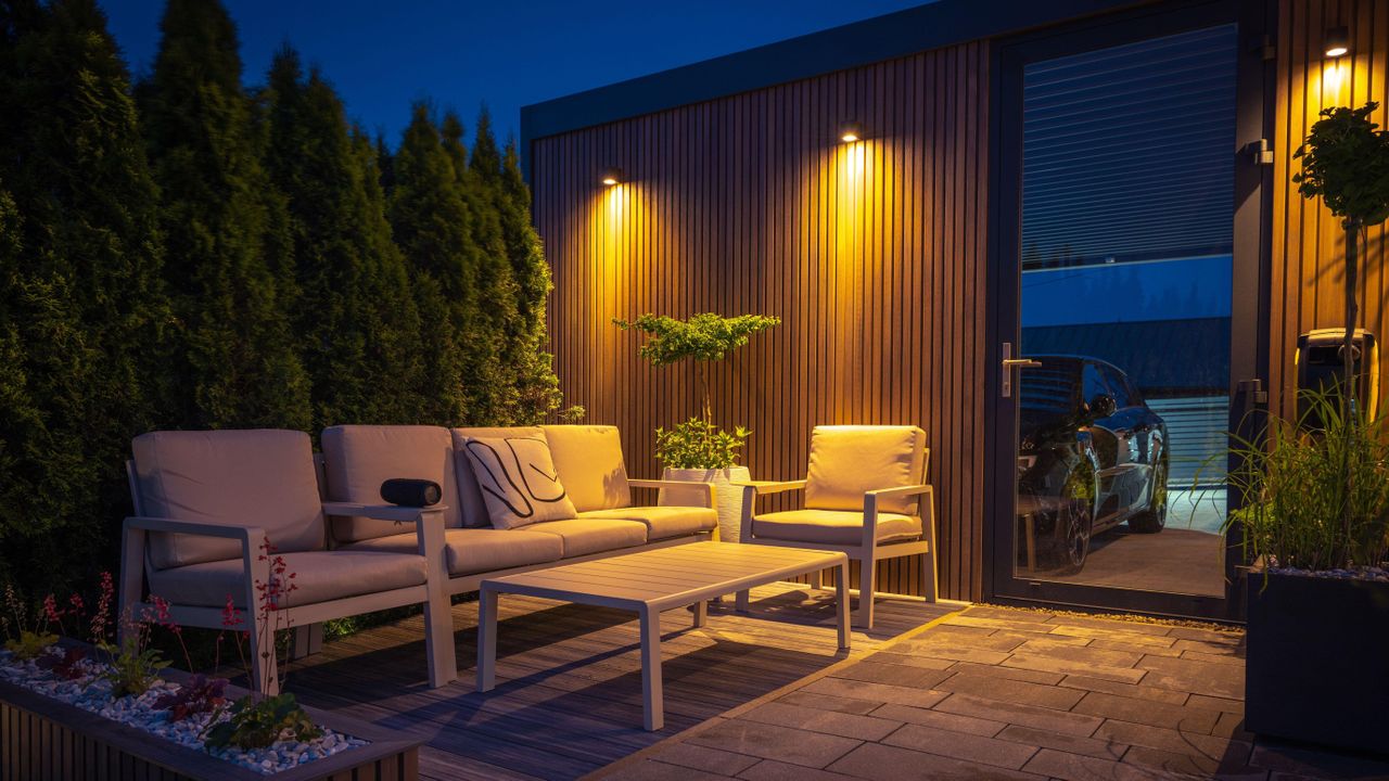 Outdoor patio area lit up in the evening