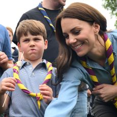 Prince Louis eats too many marshmallows and puts his hand over mom Kate Middleton's mouth