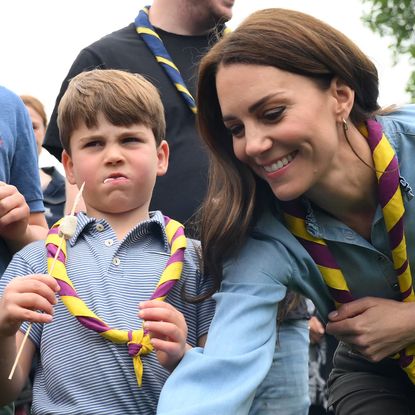 Prince Louis eats too many marshmallows and puts his hand over mom Kate Middleton's mouth