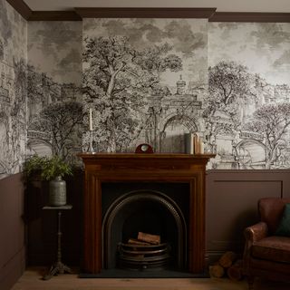 Graham & Brown wallpaper with brown painted moulding in living room