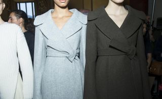 2 models wearing light grey and charcoal winter coats