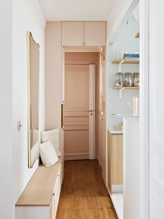 A hallway with multi-functional furniture