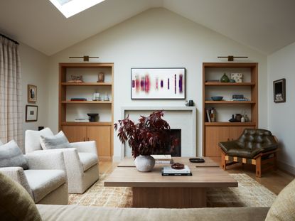 a living room with built in storage